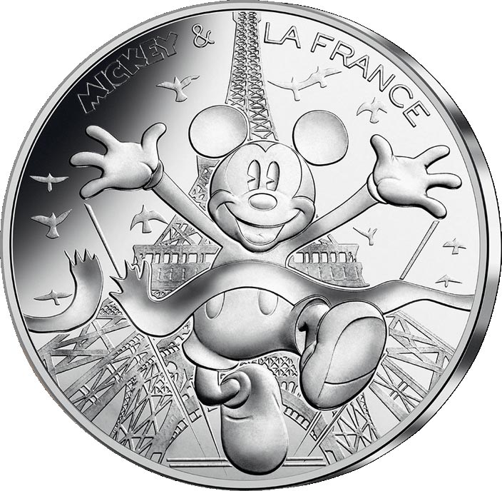 Image of 10 euro coin - Mickey et la France - At the feet of the Iron Lady | France 2018.  The Silver coin is of UNC quality.